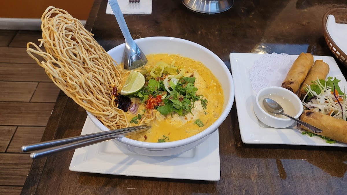 Khao Soi curry noodle soup with crispy noodles and fresh rolls at Kindee Thai Restaurant in Vancouver, WA